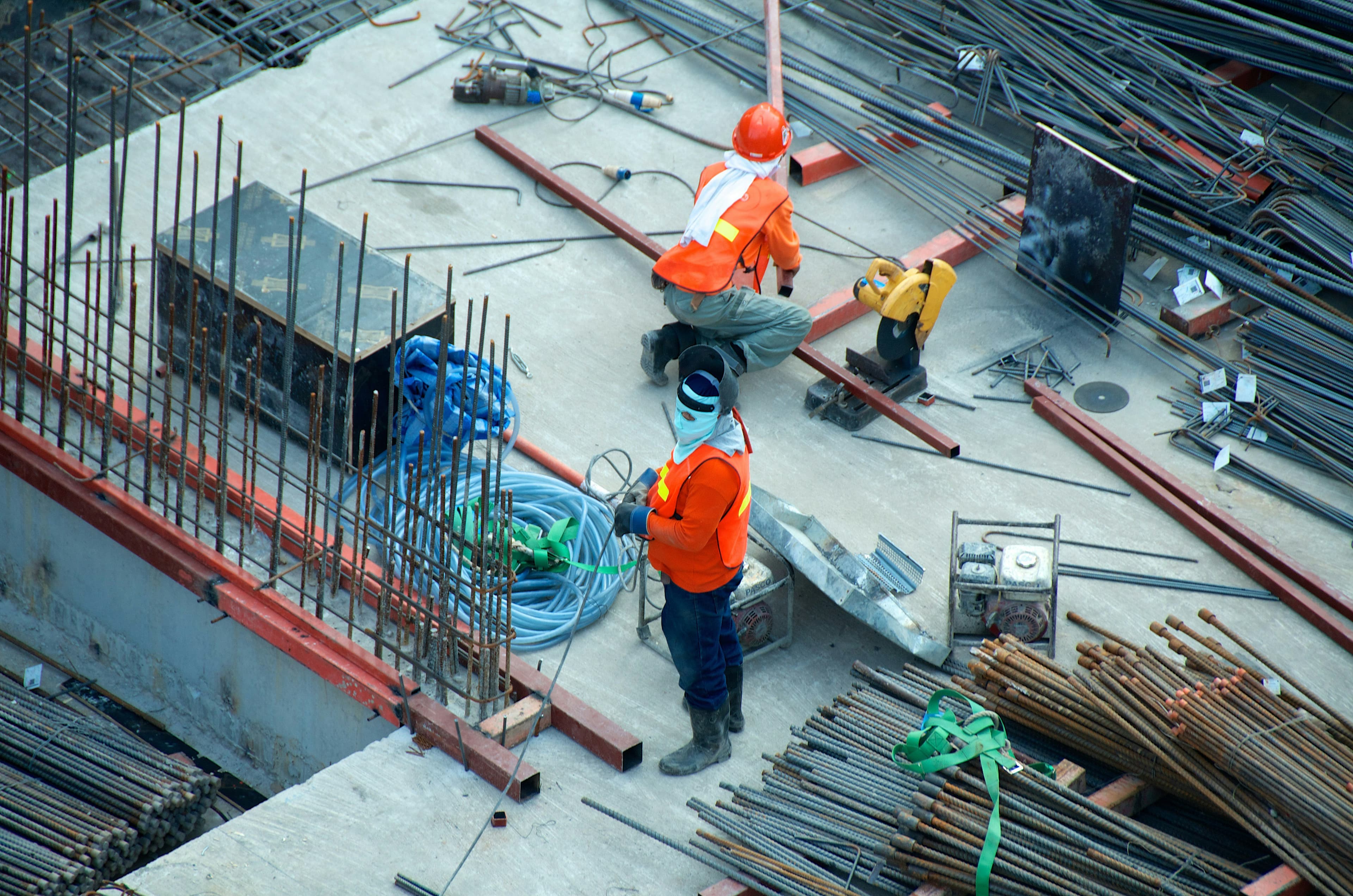 Heavy machinery and industrial goods secured with straps in a full truck load vehicle
